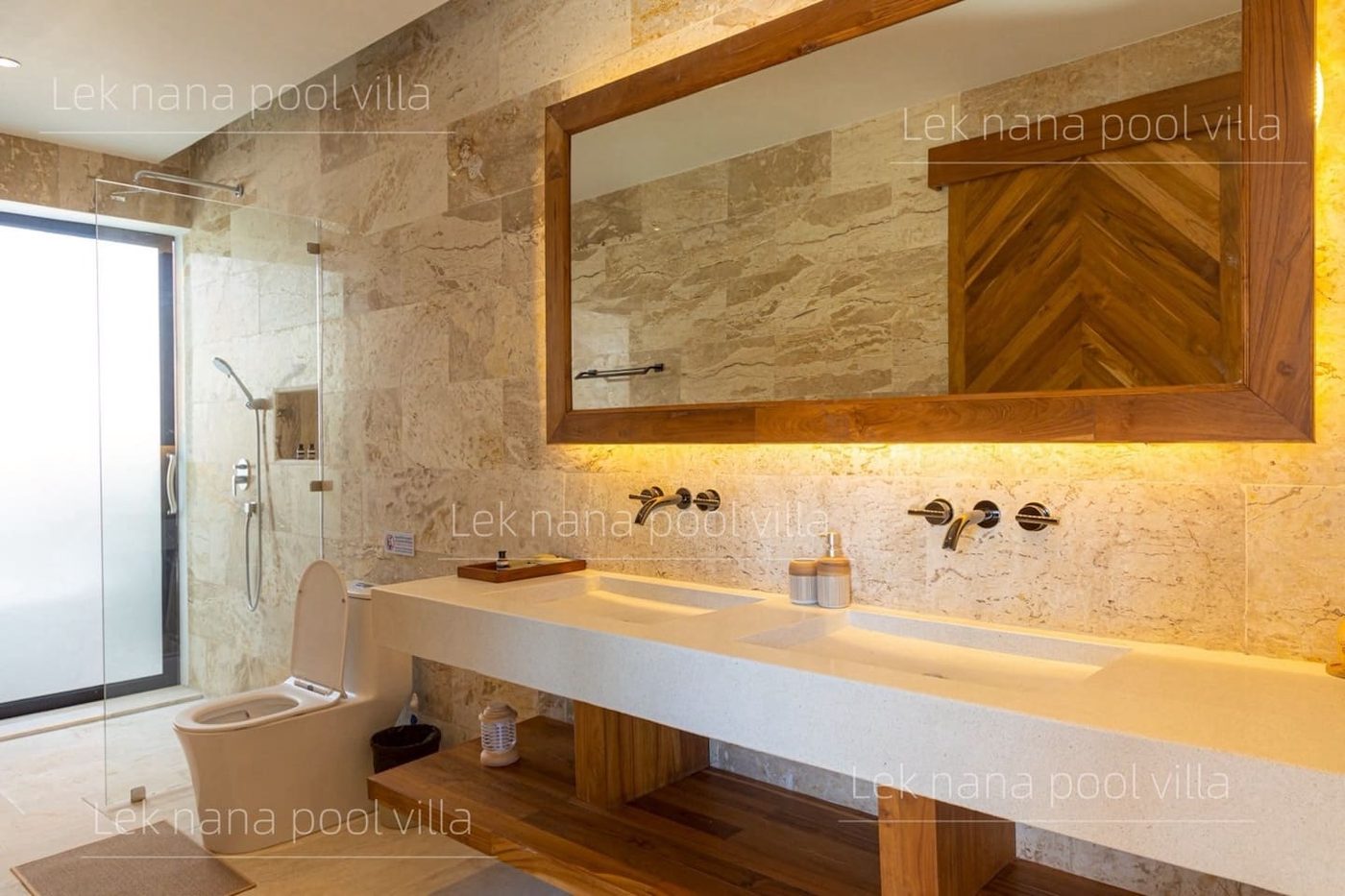Lek Nana Bophut Phase 2 — bathroom with natural stone and a double washbasin